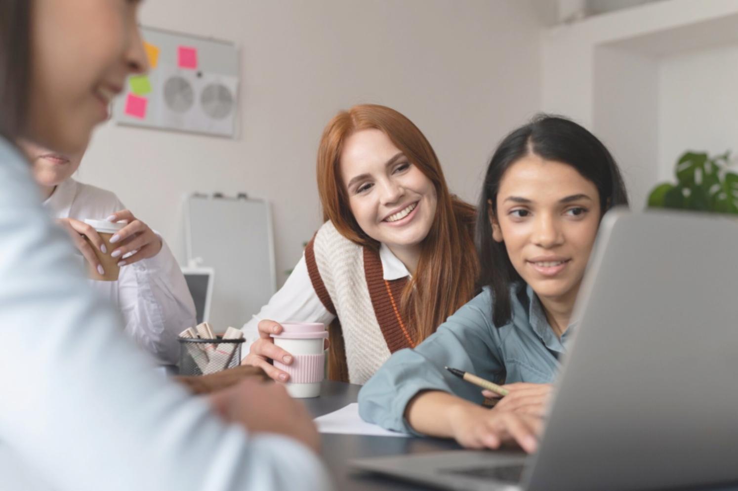Students collaborating on SEO project work during hands-on training session